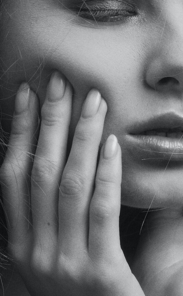 Grayscale Photo of Woman's Face