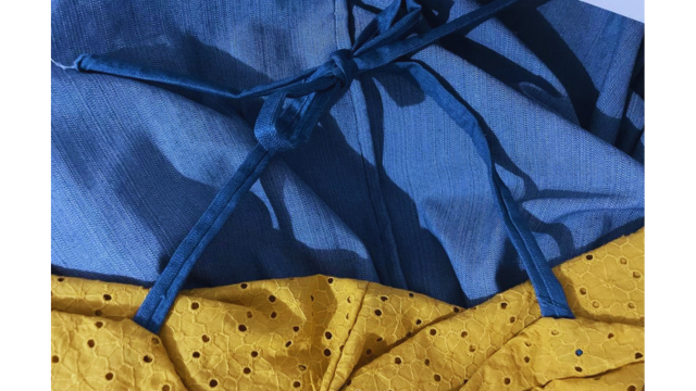 Tie the straps in a bow to keep them out of the way