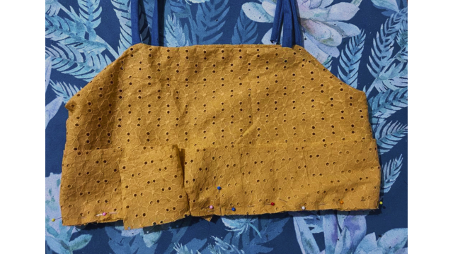 Pin the waistband in place on the gathered dress