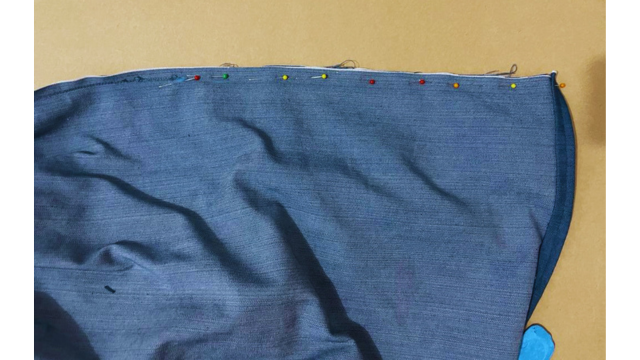 Pin the rest of the skirt and sew together the gathered dress