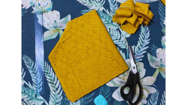 Fold the top in half and cut an armpit curve